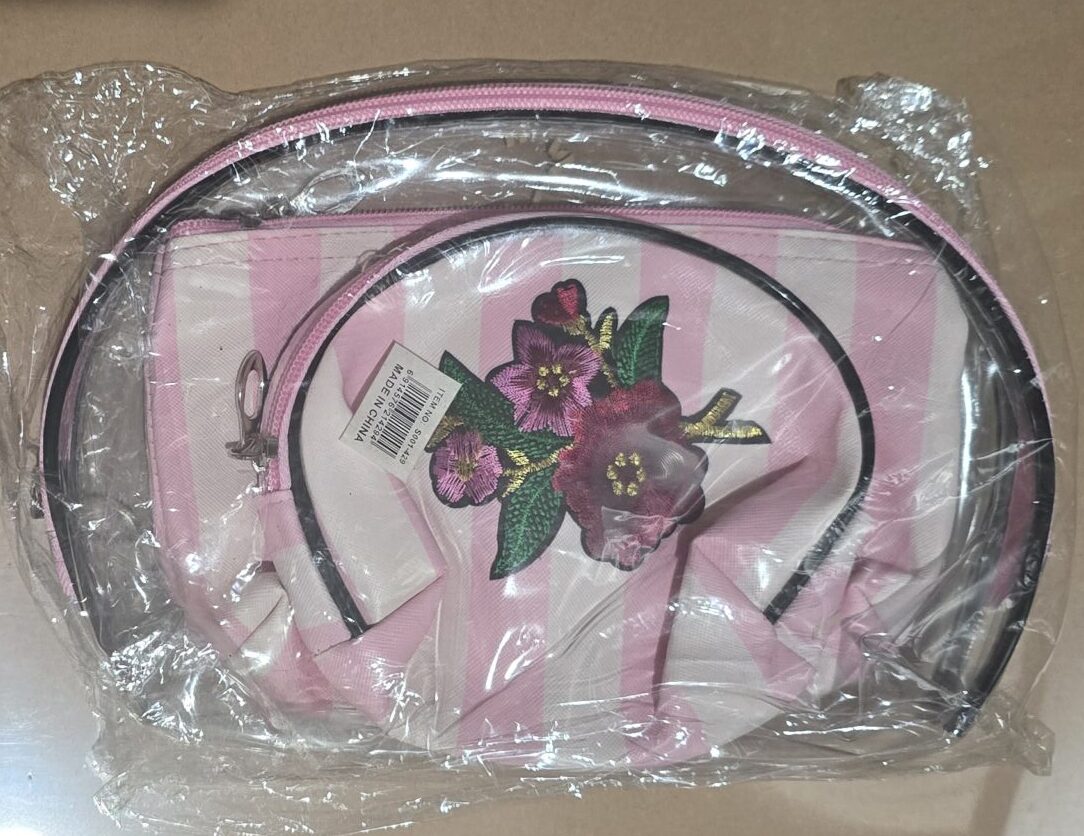 pack of three white cosmetic bags with stripes, flowers, transparent - Image 3